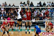 ND Royal Mikaila Genereux connects with the ball as Knights Jadyn Palomares contests. (Photo by Michael Blas)