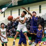 JFK Islanders Karl De Mesa flies past the GW defense to knock in another two points. (Photo by Michael Blas)