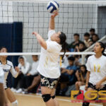 George Washington Geckos Kiyoko Afaisen gets a hand on the ball, sending it over to the St. Paul Warriors. (Photo by Michael Blas)