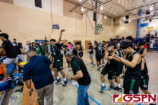 The JFK Islanders celebrate after defeating the Okkodo Bulldogs 80-68, becoming the first ever ISA Boys Basketball Champions. (Photo by Michael Blas)