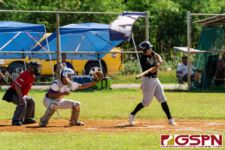 JFK Islander John Cruz swings at the ball in the early innings of the matchup. (Photo by Michael Blas)
