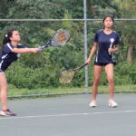 The Cougar tandem of Christabelle Basto and Emilee Yamamoto face off against Knights Luna Puangco and Kaia Malakooti. (photo by Robert Balajadia)