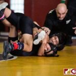 High School wrestlers hit the mats in a Preseason Tournament held at the FD Jungle. (photo by Bout It Productions.)