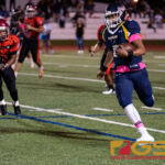 Guam High Panthers RaSean Jacobs drives the ball forward for a first down and more. (Photo by Michael Blas)
