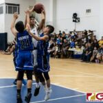 St. Paul Warriors Xander Sanchez goes for a short range two pointer with two Bishop defenders contesting. (Photo by Michael Blas)