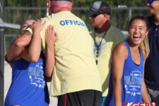 Father and daughter Chris Shepherd and Tylee share a hug post game after winning the tournament. (photo by Robert Balajadia)