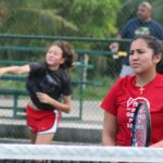 The Cougar tandem of Christabelle Basto and Emilee Yamamoto face off against Knights Luna Puangco and Kaia Malakooti. (photo by Robert Balajadia)