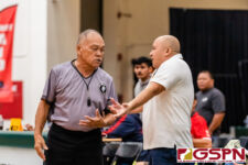 FD Friar Head Coach Eddie Pelkey and a referee argue over a call in the third quarter. (Photo by Michael Blas)
