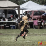 Guahan Eagles Lukas Leon Guererro finds an opening on the left sidelines for a big touchdown run. (photo by Bout It Productions)
