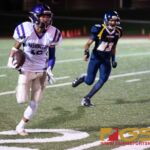 GW Geckos' Aaron Jamanila brings the ball up field after a punt from the Guam High Panthers. (Photo by Michael Blas)
