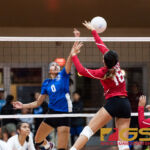 St. John's Knights Angeline Del Carmen makes a block against Ella Balajadia. (Photo by Michael Blas)