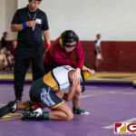 High School wrestlers hit the mats in a Preseason Tournament held at the FD Jungle. (photo by Bout It Productions.)