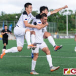 Guams Marlon Evans and Edward Na celebrate with Jason Cunliffe after his second goal of the game. (Photo by Michael Blas)