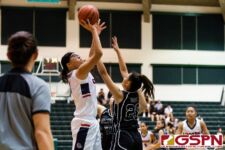 Okkodo Bulldog Angeli Dacanay takes a jump shot while Warriors Monica Giger contests. (Photo by Michael Blas)