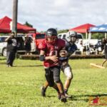 Faha Outlaws Anthony Bonarrigo completes the pass for the two point conversion. (photo by Bout It Productions)
