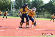 Panther Lexi Blyth and Lara Camacho converge on a bunt to get an out at first. (photo by Robert Balajadia)