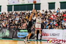 Guam's Joe Blas sinks in a three-pointer in the fourth quarter against New Zealand's Ethan Rusbatch. New Zealand defeated Guam 113-94 in the FIBA Asia Cup 2021 Qualifiers match. (Photo by Michael Blas)