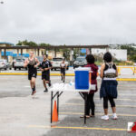 The Sanchez Sharks cross country team visited the Tiyan Titans in the 2nd week of the ISA cross country season. Photo by Bout It Productions