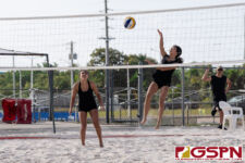 St. John's Knight Yasmeen Lopez spikes the ball over the net against the Harvest Eagles. (Photo by Michael Blas)