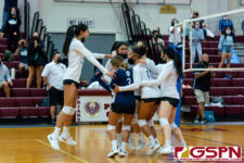 The Academy Cougars celebrate after defeating the ND Royals in the 5th set to become the 2021 IIAAG Girls Volleyball Champions. (Photo by Michael Blas)