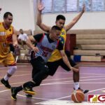 Southerns Roque Charfarous drives towards the net while Paradise Phoenix Sons defender keeps the pressure on him. (Photo by Michael Blas)