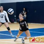 St. Paul Warriors Tiffani Lopez leans in for a bump after a return ball from the George Washington Geckos. (Photo by Michael Blas)