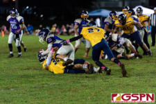 Guam High Panther Terrell Rosario tackles Gecko Brendyn Cruz for an incompletion. (Photo by Michael Blas)