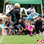 Tiyan Titan Darren Cruz makes the catch and runs into the end zone for a touchdown late in the 4th quarter. (Photo by Michael Blas)