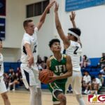 JFK Islanders King Karl De Mesa gets through the Harvest Eagles defense for a shot at the bucket. (Photo by Michael Blas)