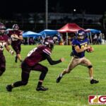 GW Gecko RB looks for an opening as FD Friars DB Nate Mendiola stays on him. (Photo by Michael Blas)
