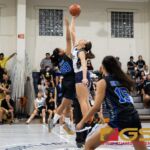 Academy Cougars Mia San Nicolas wins the jump ball to start their game against the Notre Dame Royals. (Photo by Michael Blas)