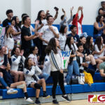 Harvest Eagles supporters cheer on their team as they go on a hot streak in the fourth and final set. (Photo by Michael Blas)