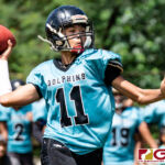 Southern Dolphin QB Ethaniel Escuadra loads up for a deep pass down the middle. (Photo by Michael Blas)