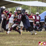 Team Legacy Kaylani Plain Cruz gets wrapped up by Island Stunnerz Emiliana Cepeda. (photo by Bout It Productions)
