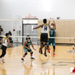 Tiyan High Titan Dewayne Ngirarikl sends the ball flying across to the awaiting Jfk Islanders. Photo by Bout It Productions
