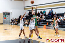 JFK Islander Frencine Villena pulls a post fade for two points in the second quarter of the game. (Photo by Michael Blas)