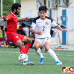Guam Matao Defender Isiah Lagutang gets the ball past Maldives Ibrahim Mahudhee. (Photo by Michael Blas)
