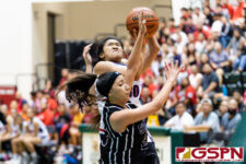 Okkodo Bulldog Vanezza Gustilo draws a foul on Kayla Senne in the second quarter of the championship game. (Photo by Michael Blas)