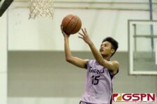 Sanchez Shark John Macaldo attacks the basket on a fast break in the second quarter. (Photo by Michael Blas)