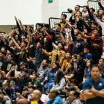 Friars fans rumble the UOG Calvo Field House as their team regains the lead in the final minutes of the game. (Photo by Michael Blas)