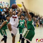 Okkodo Bulldogs Jon Michael Lorena leaps up for a shot after bringing in the rebound. (Photo by Michael Blas)