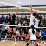 Tiyan Titan Vicotria Serious tips while Islanders Kiana Rivera, right, and Isabella Roberto, left, look to block. (Photo by Michael Blas)