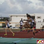 This Friday's IIAAG Track & Field Meet moves to the ocean scenery of J.F.K High. The sweltering heat was on but the fans and athletes still put on a show. (photo by Bout It Productions)